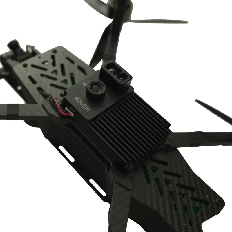 Black N200M VIO Navigation Module plugged on a drone on a white background closed-up