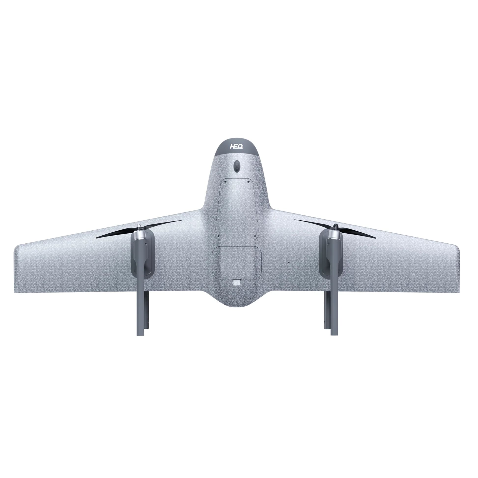 A front view of a silver HEQ drone with four propellers on a white background 