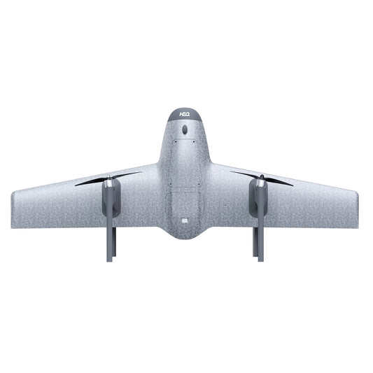 A front view of a silver HEQ drone with four propellers on a white background 
