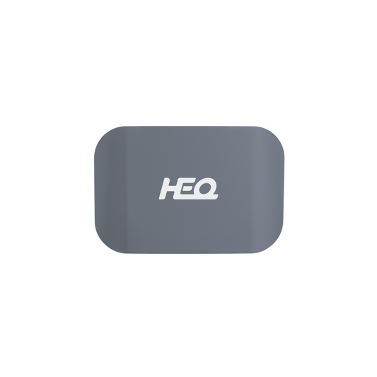 A gray plastic battery cover with the HEQ brand logo on it.